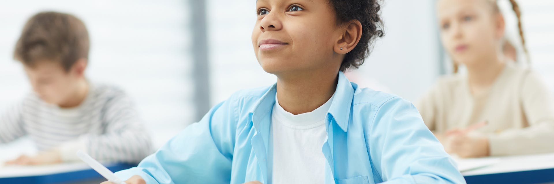 Student sits in a classroom using distributed practice.