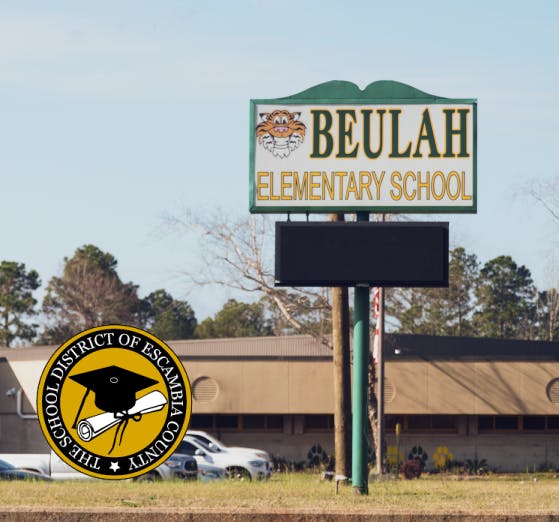 A picture of the outside of Beulah Elementary School in Escambia County, Florida with the school district logo.