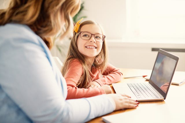 Student and parent on computer