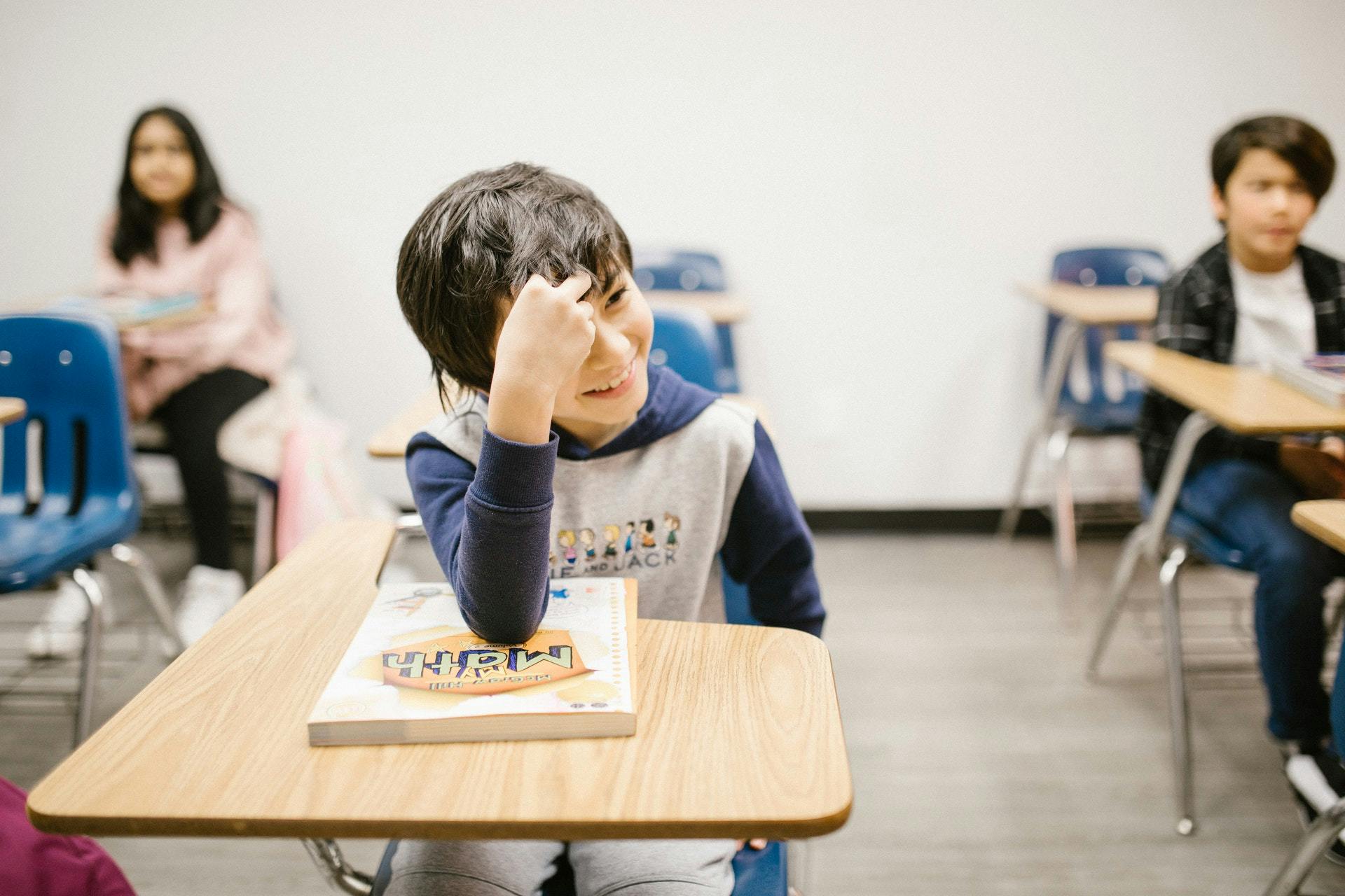 Students in a classroom play fun recap activities as they prepare for standardized testing season. 