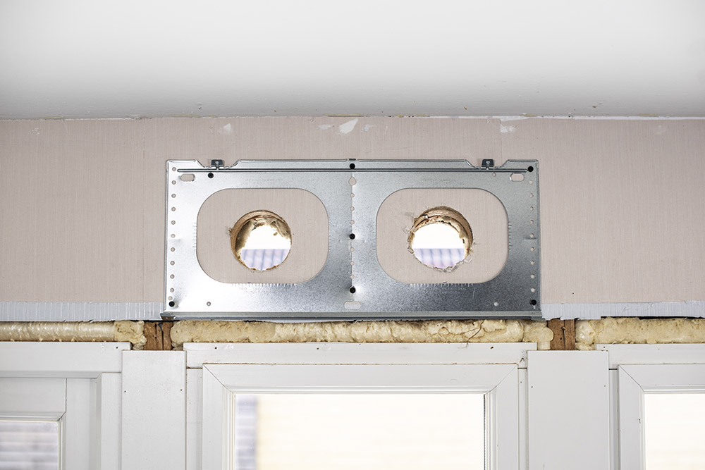 borra hålen i väggen