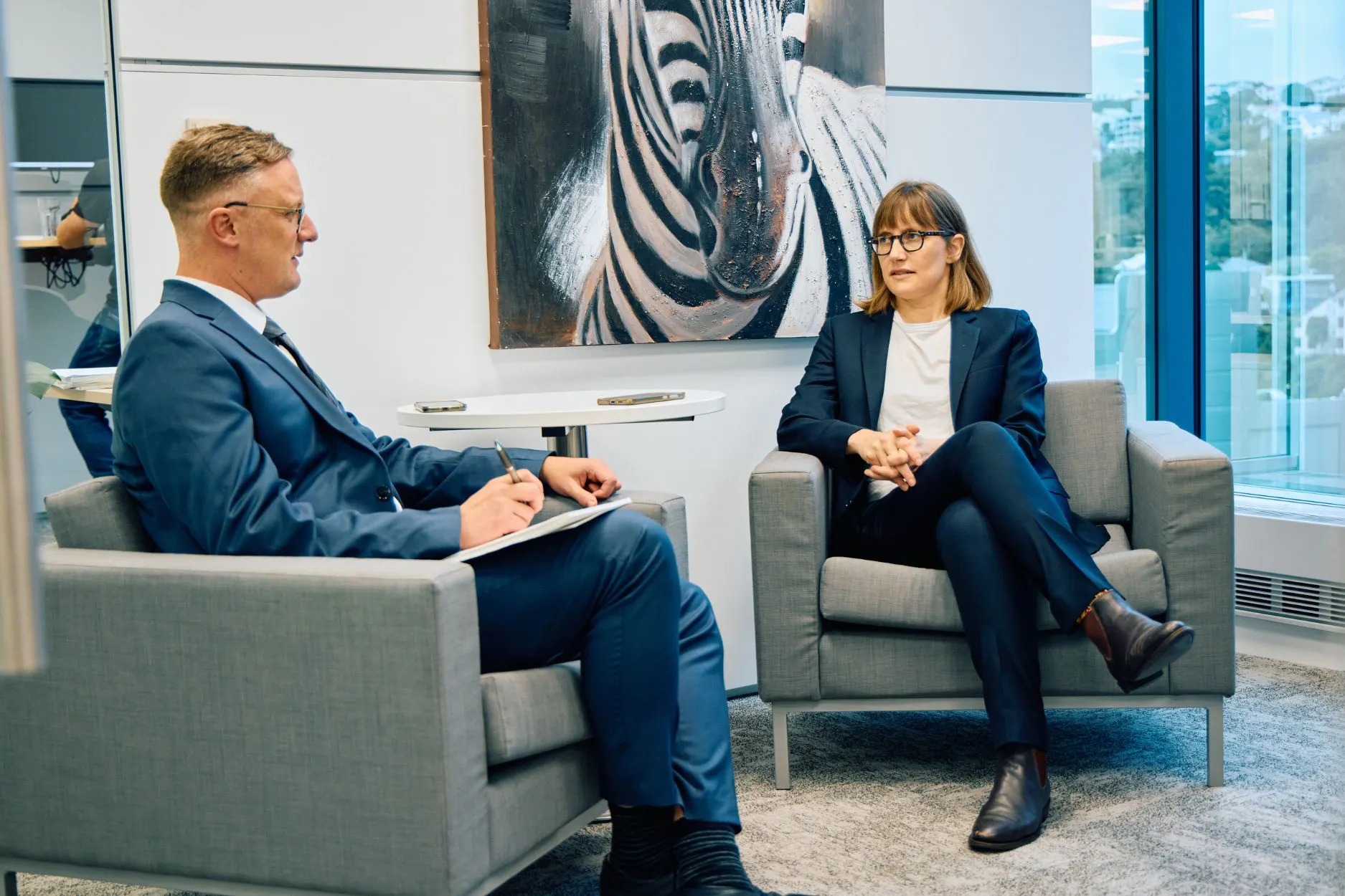 Executive photographed in a professional office environment in New Zealand