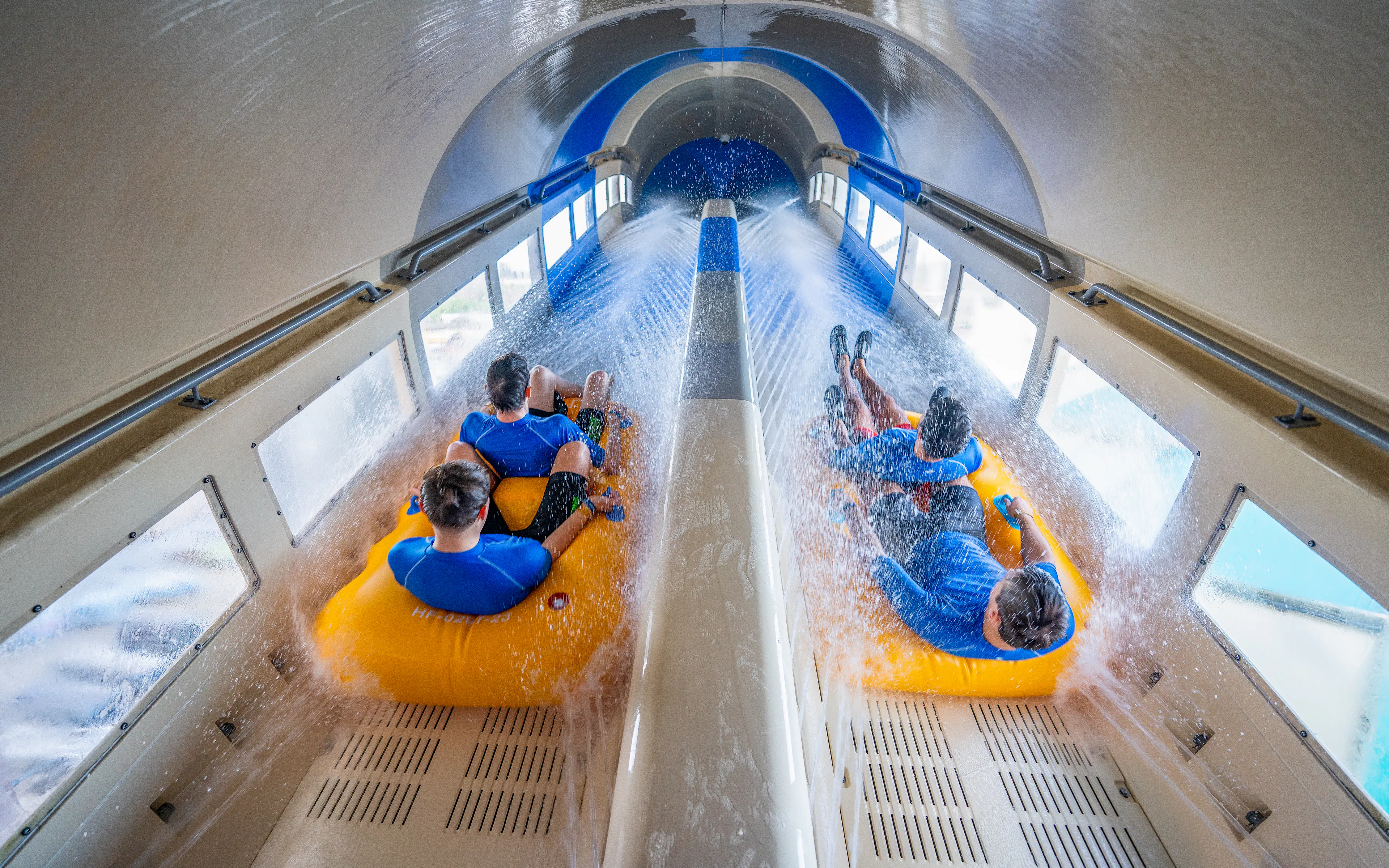 Two boats go up a blast zone of the Dueling RocketBLAST at Aqualibi water park in Belgium