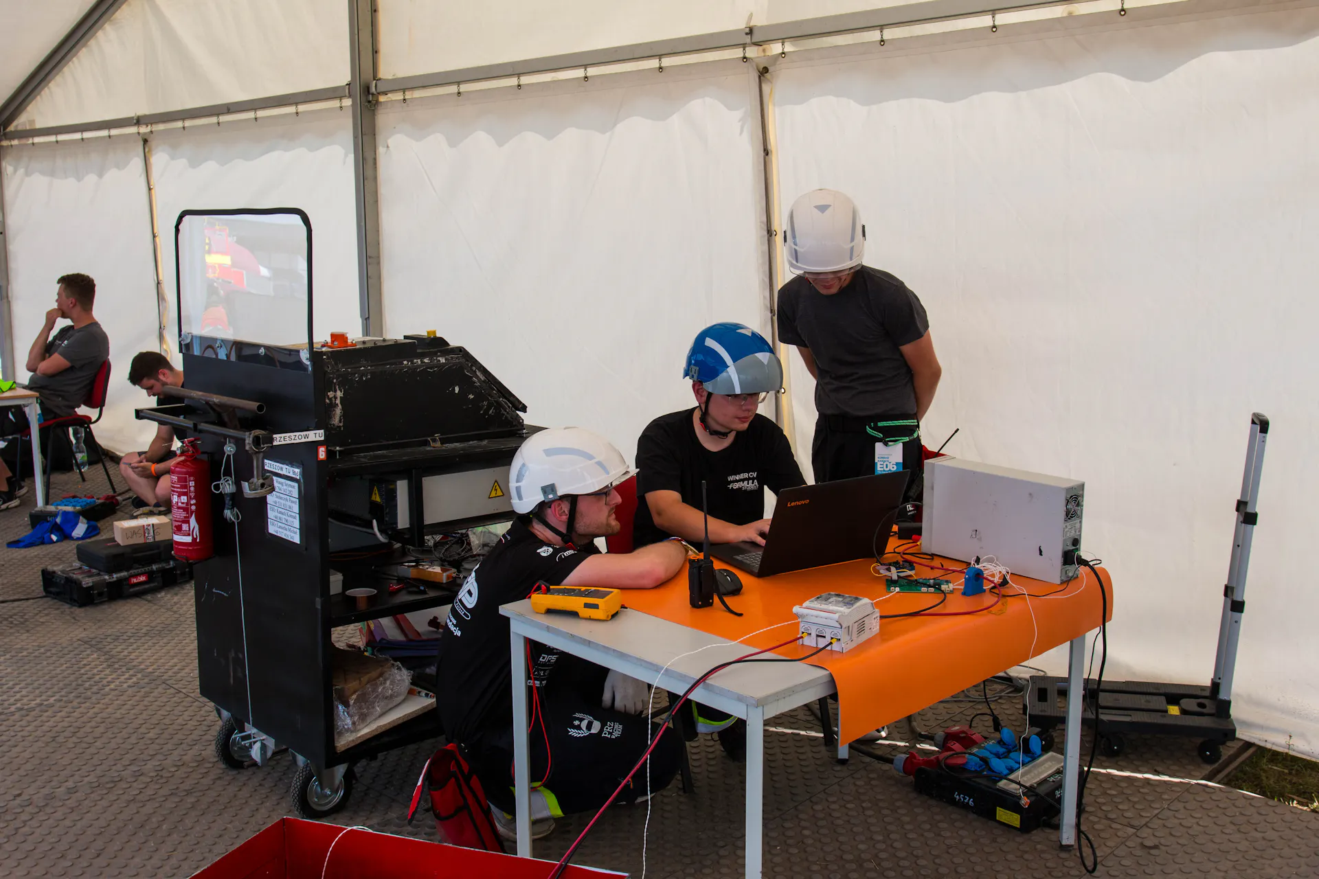 Team members photo solving electrical problem