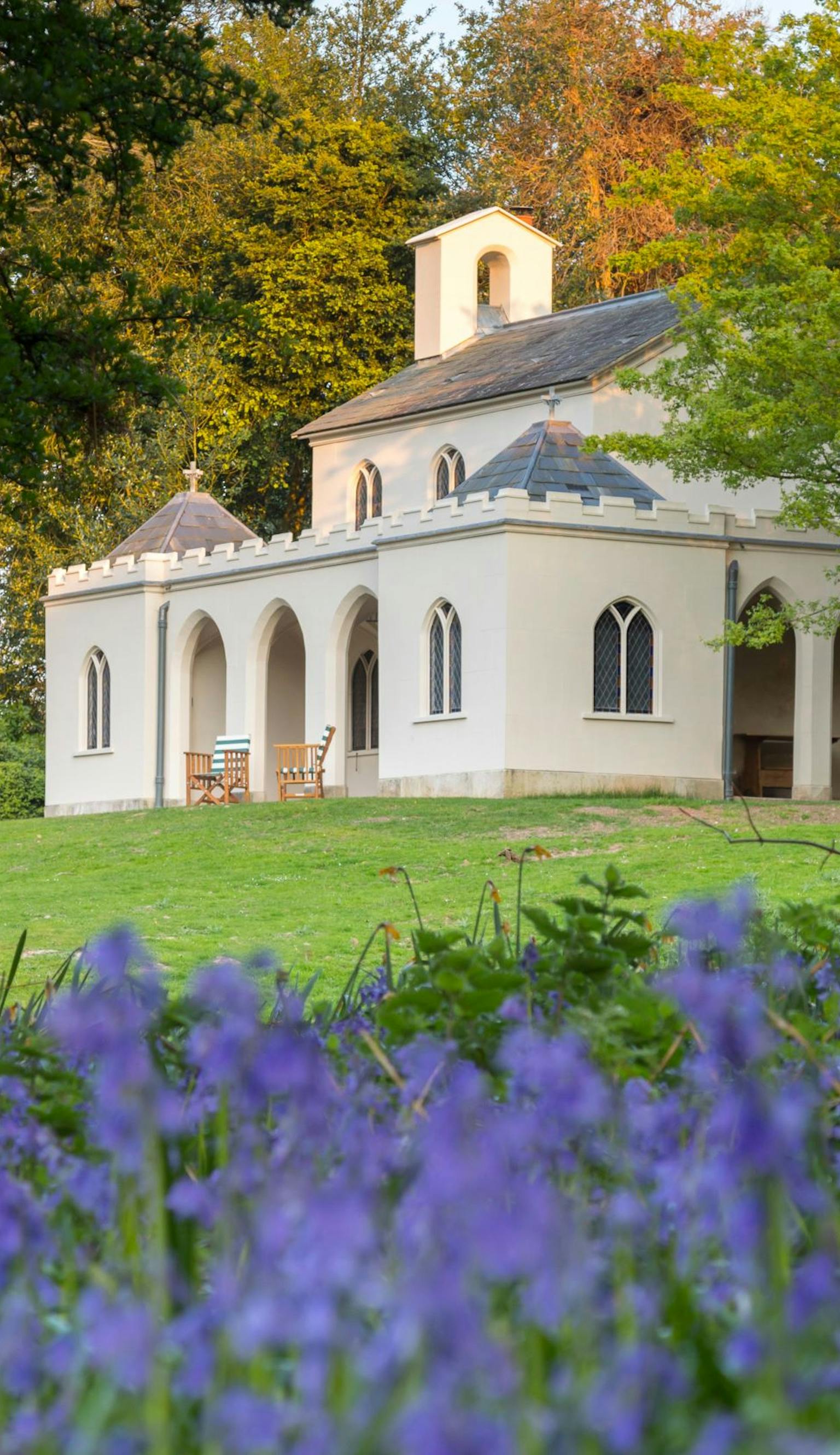 Cobham Dairy, Kent, surrounded by bluebells in the spring. Purcell undertook the conservation and repair of the old dairy, now a holiday home.