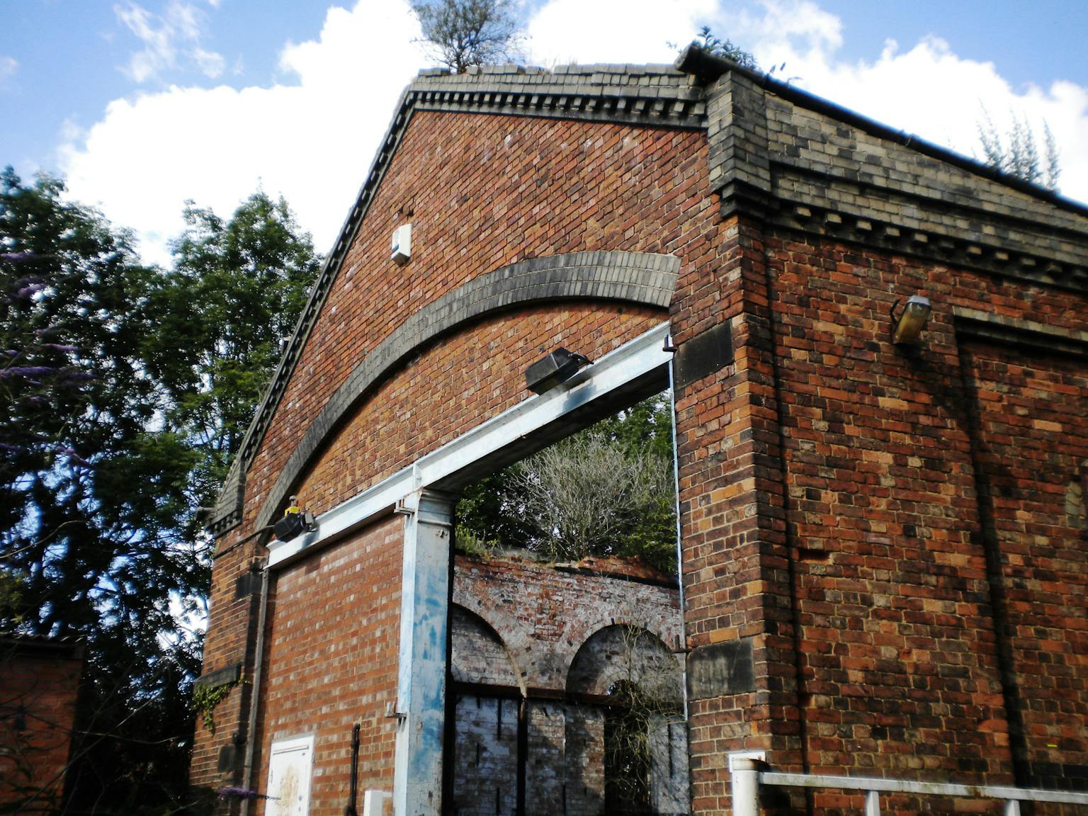 Semi-derelict west facade of the Engine Shed before the works
