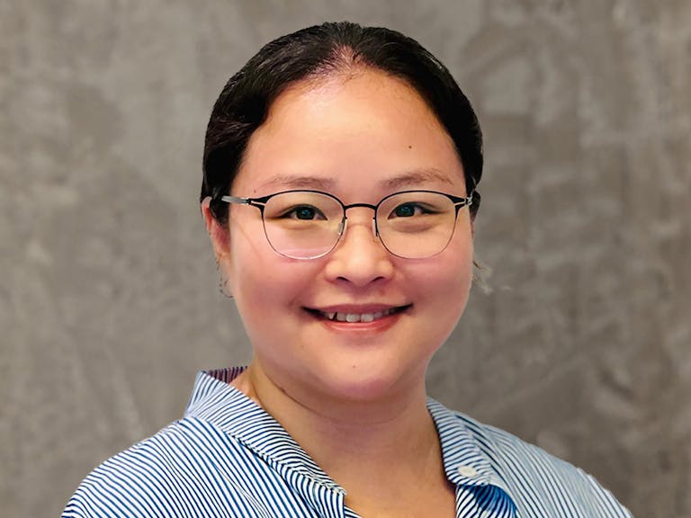 Headshot of Yoki Yau