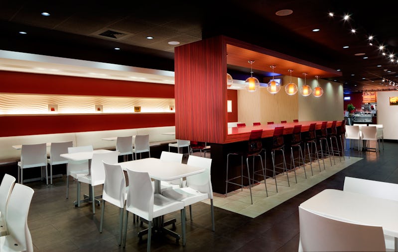 Interior photo of Chun Wah Kam Noodle Factory Kakaako with read and white accents