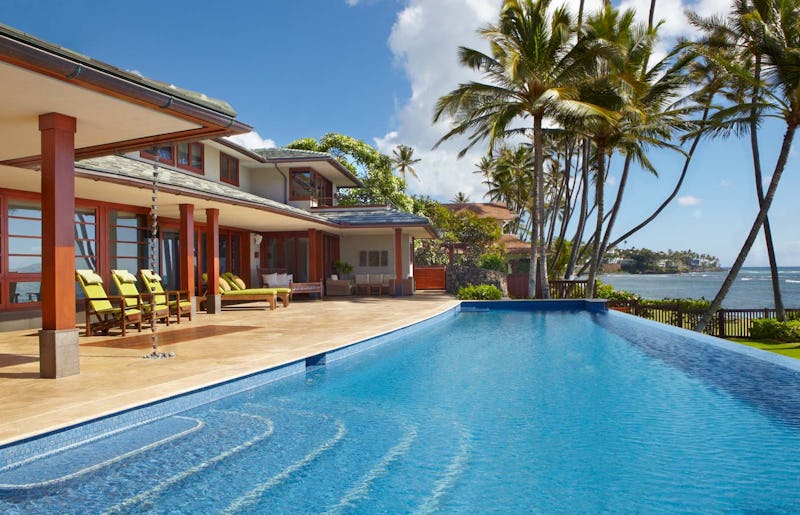 Infinity pool and pool deck overlooking ocean