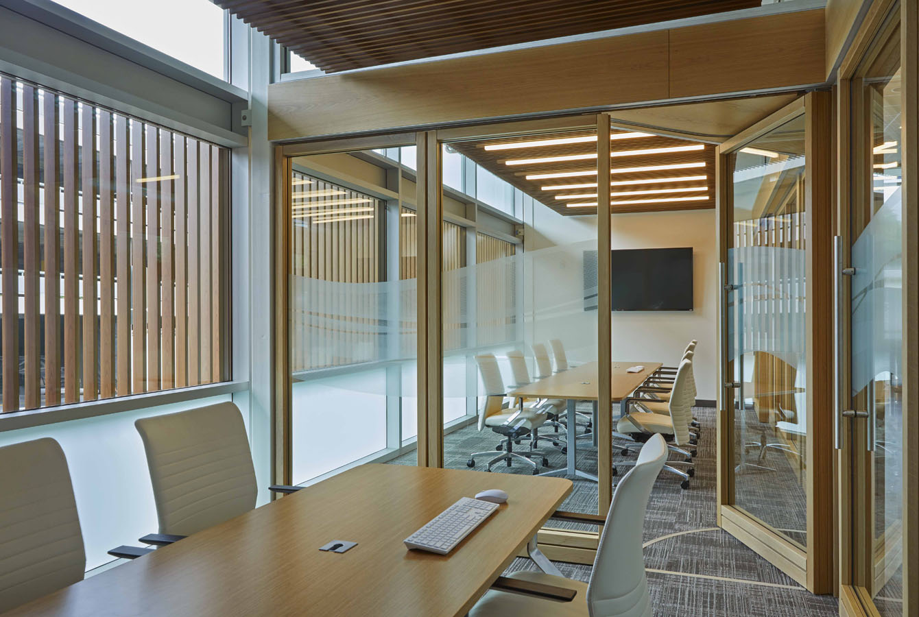 Meeting rooms with large tables and chairs at Bank of Hawaii at Pearlridge