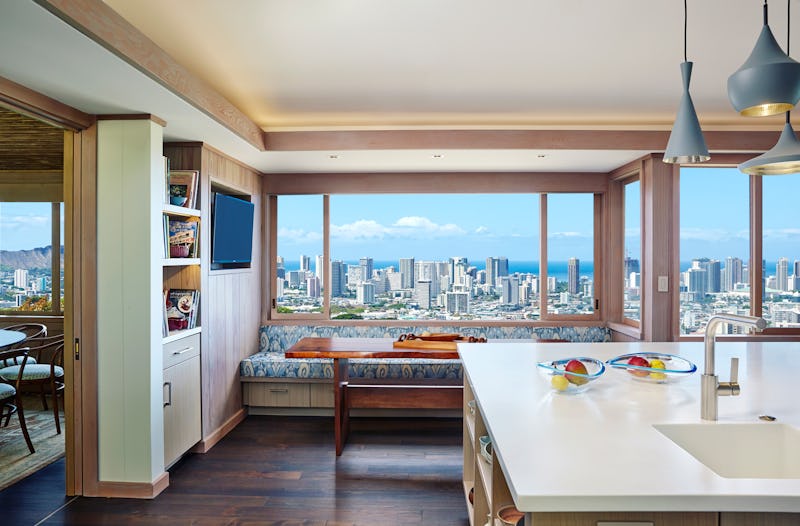 Kitchen and lounge with city view.
