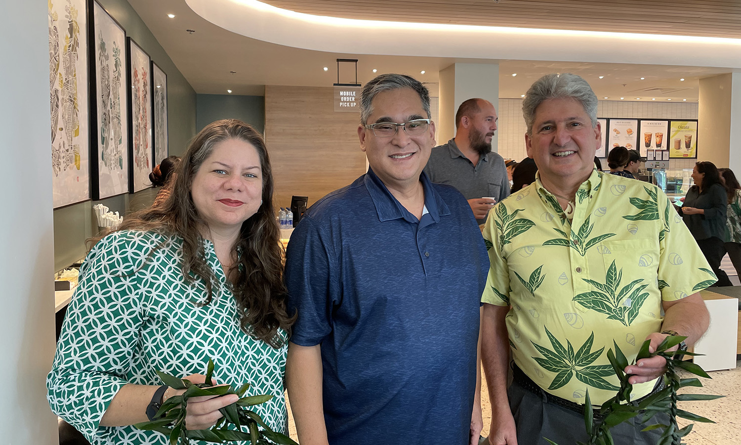 Mike Subiaga gathered with UH administration. 