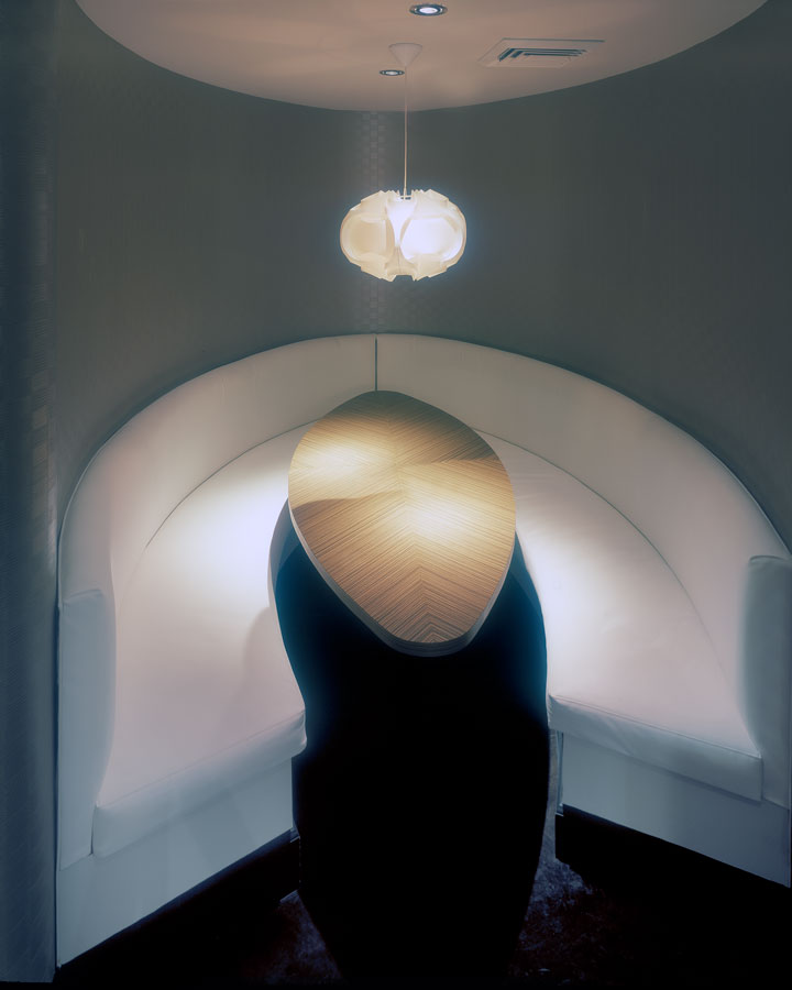 Booth seating with ceiling light fixture