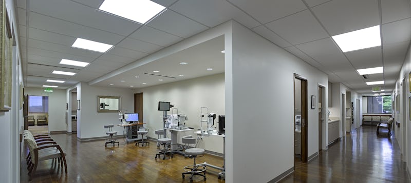 Wide-angle photo of eye doctor's machinery and hallway