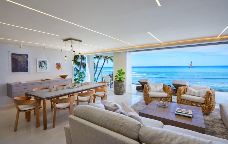 Living and dining rooms with large ocean view