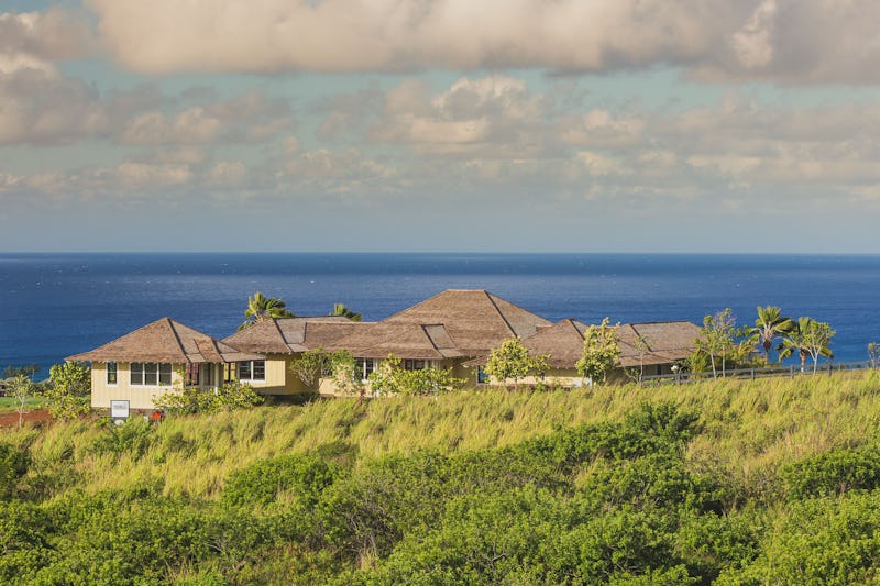 Wide shot of residence with ocean view.
