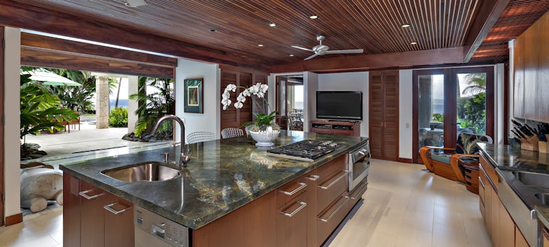 Kitchen with large island with upscale appliances