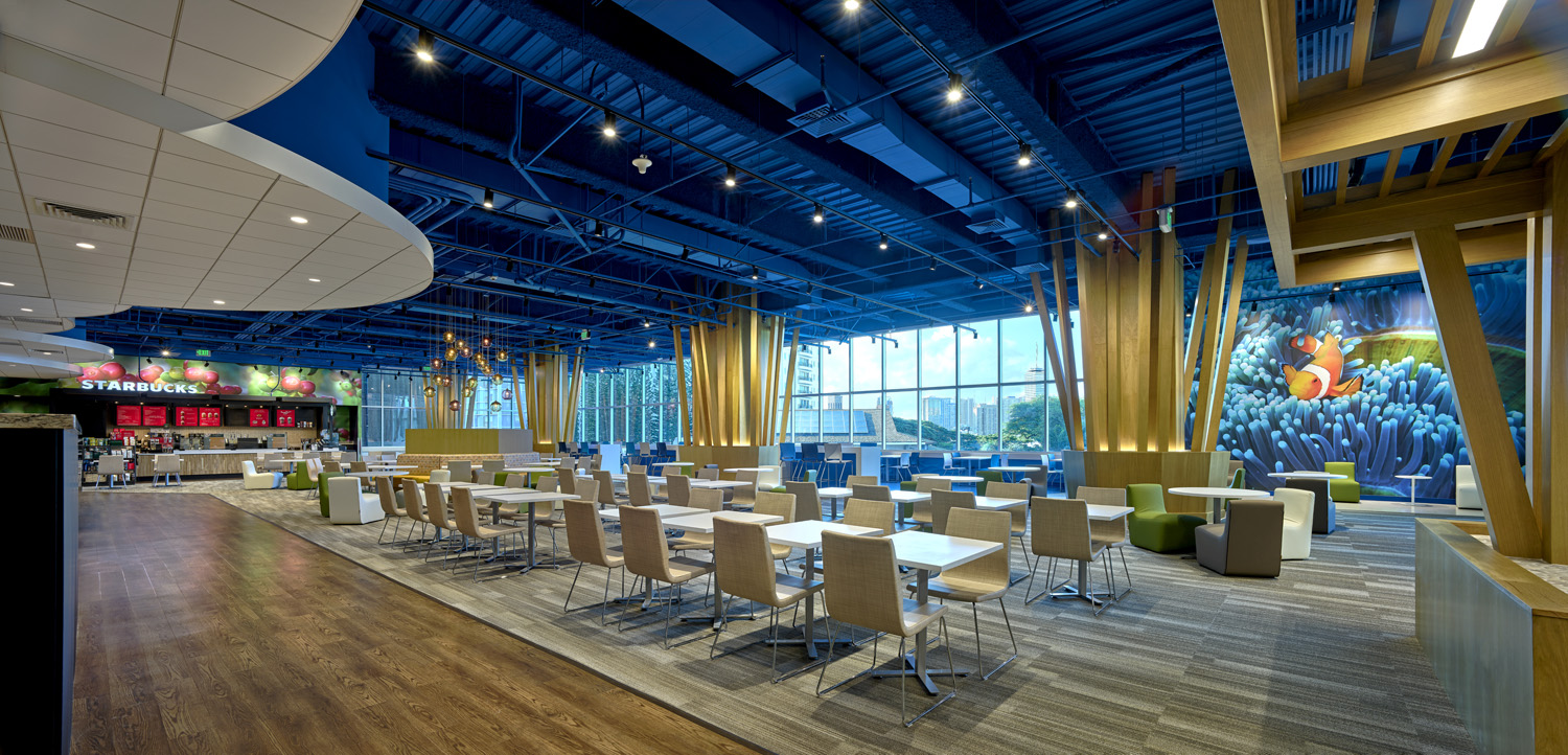 Entire space with blue cieling, trellis, and clown fish mural. 