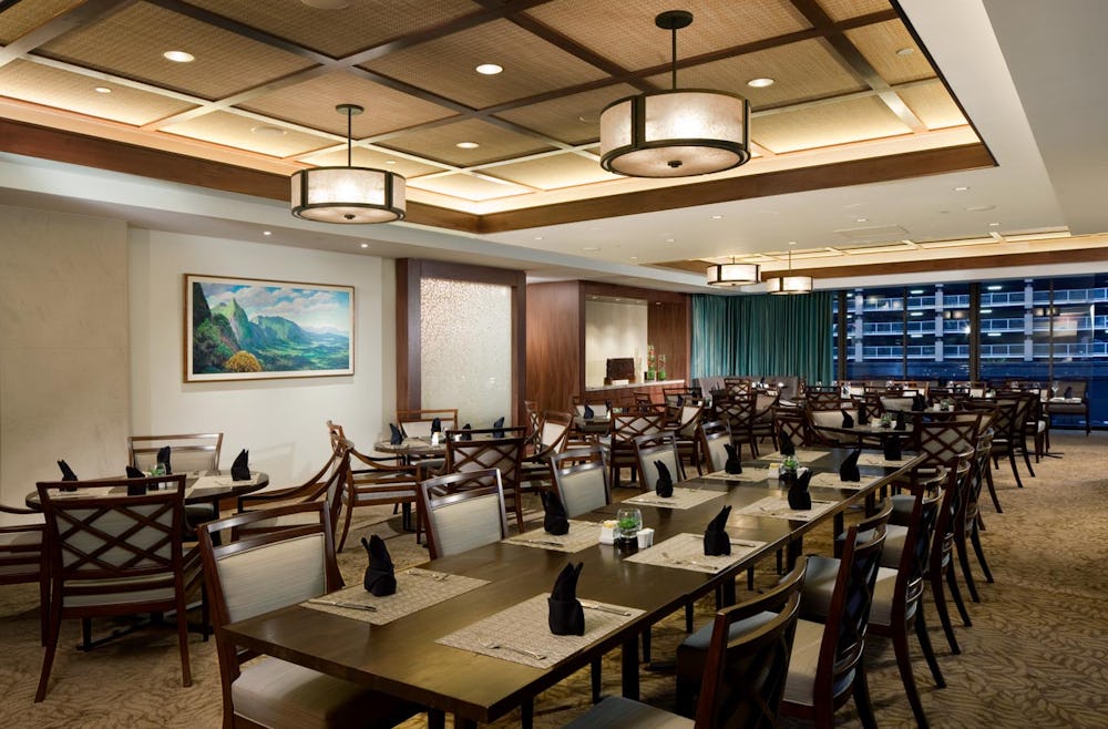 Dining room at Bank of Hawaii with table settings on each table