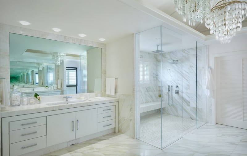 Bathroom with sink and glass walled shower