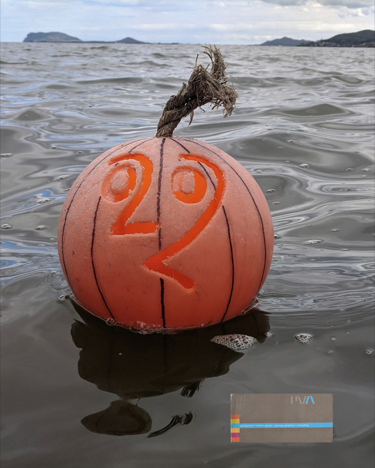 basketball decorated to look like a pumpkin