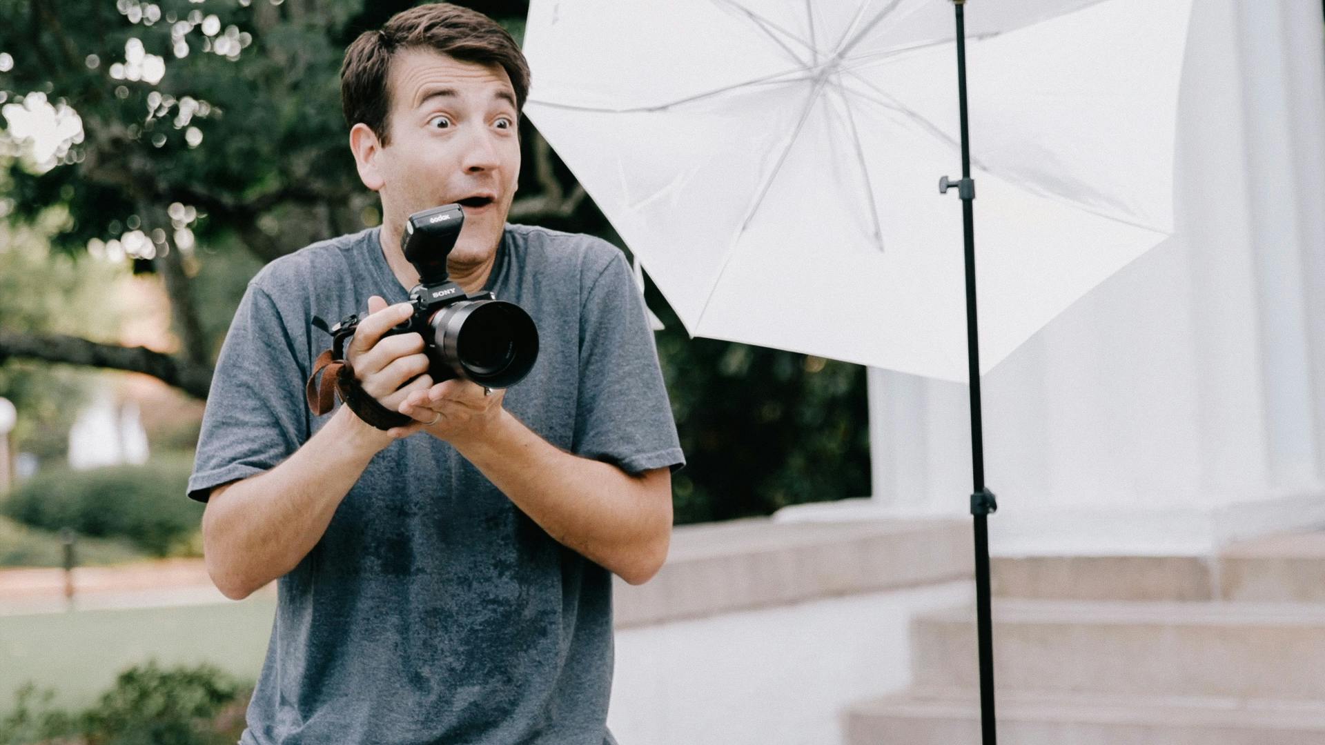 Photographer interacting  with clients to help them relax in front of the camera