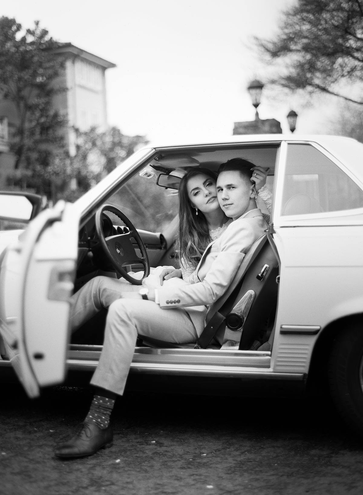 Film wedding photography by Daniel Usenko couple in car