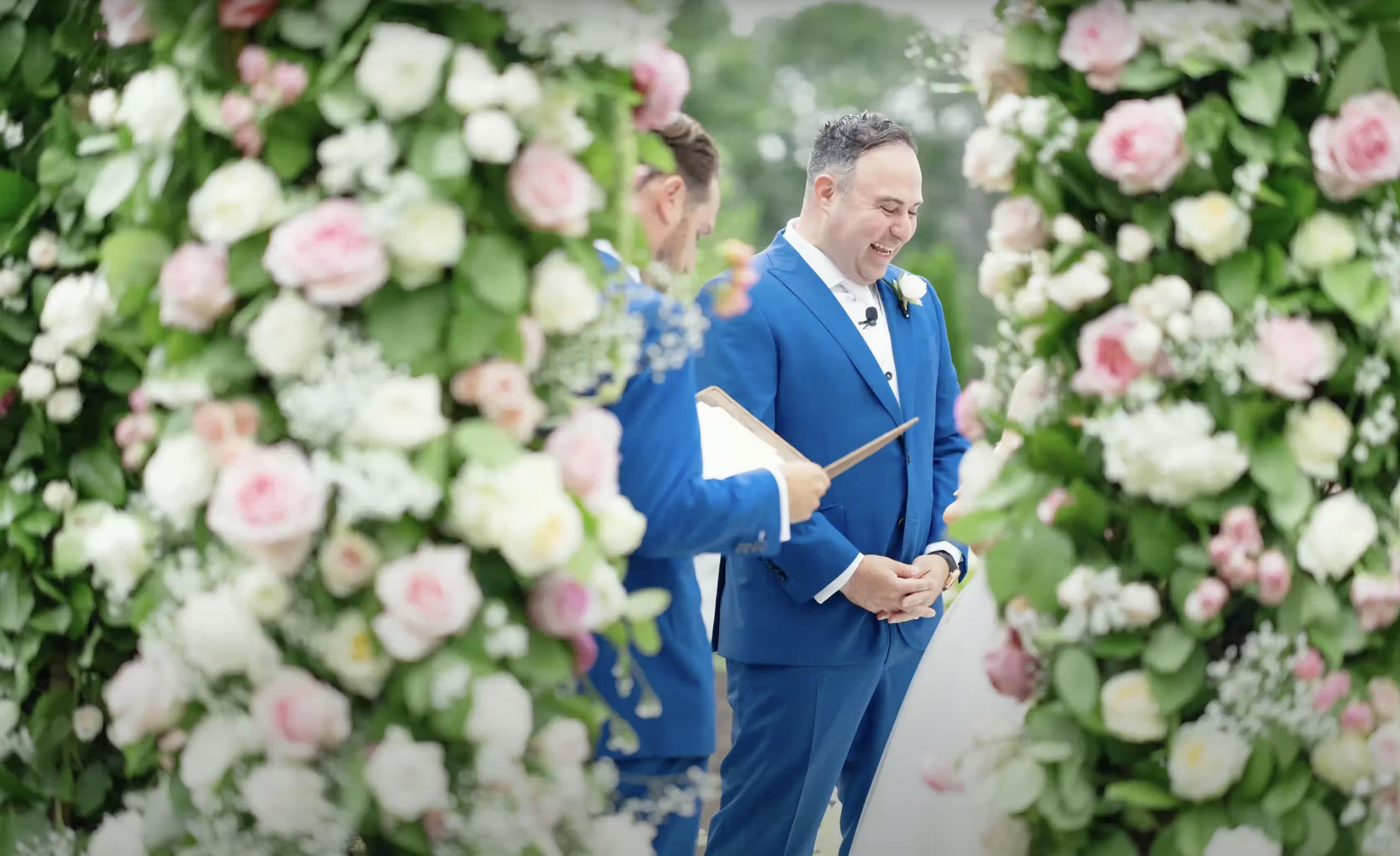 Adonye Jaja photograph of a groom waiting at a flower-covered alter