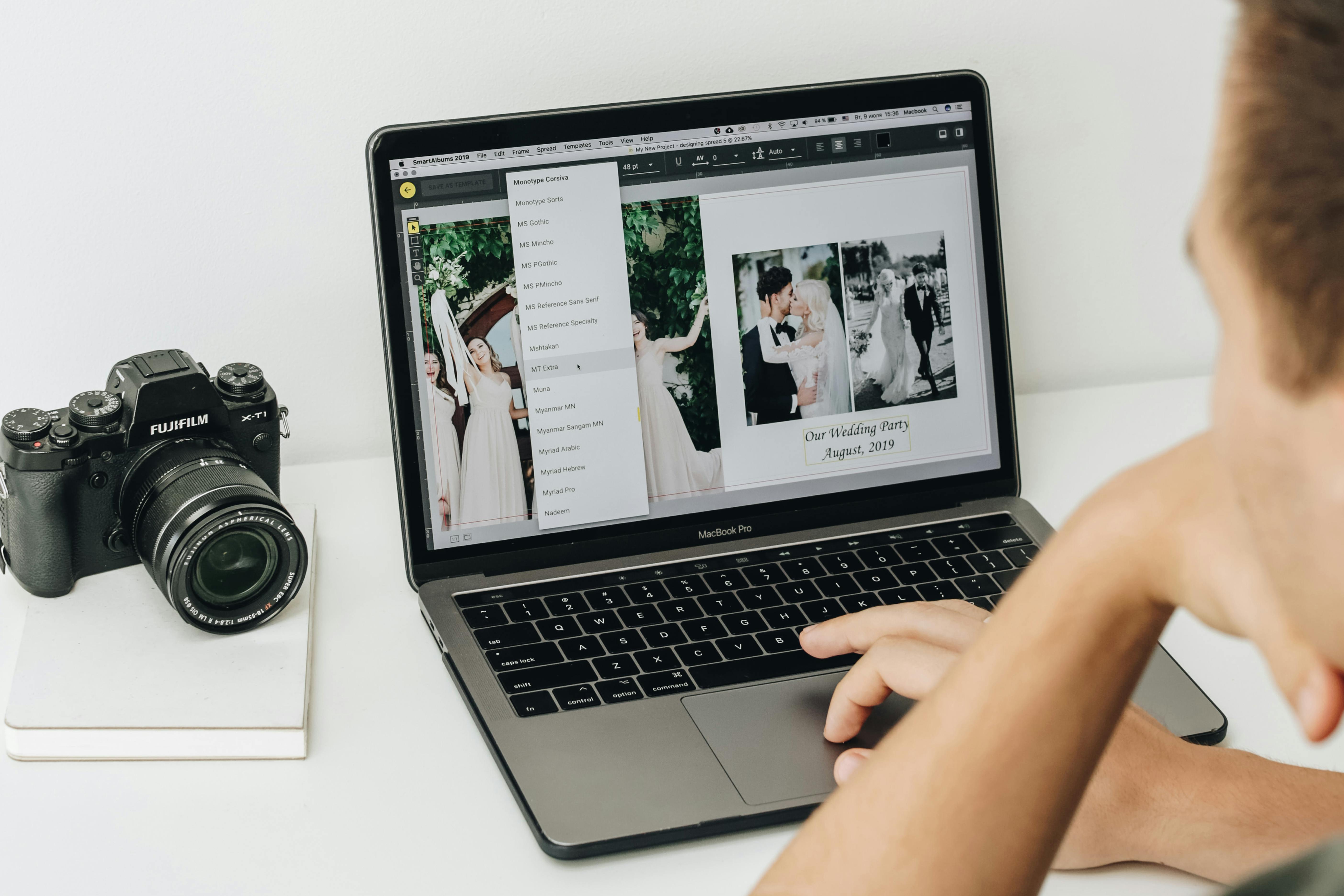 Wedding photographer using SmartAlbums 2019 to design photo album for clients