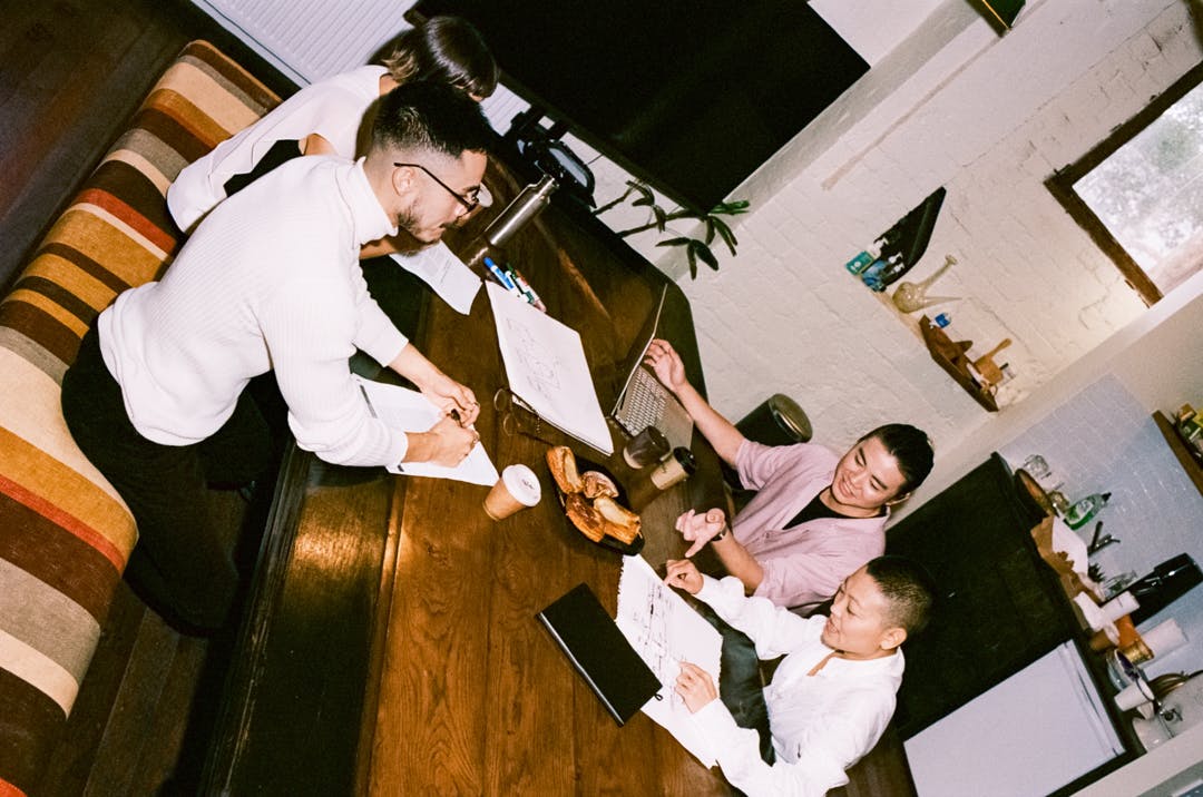 Employees working at a table