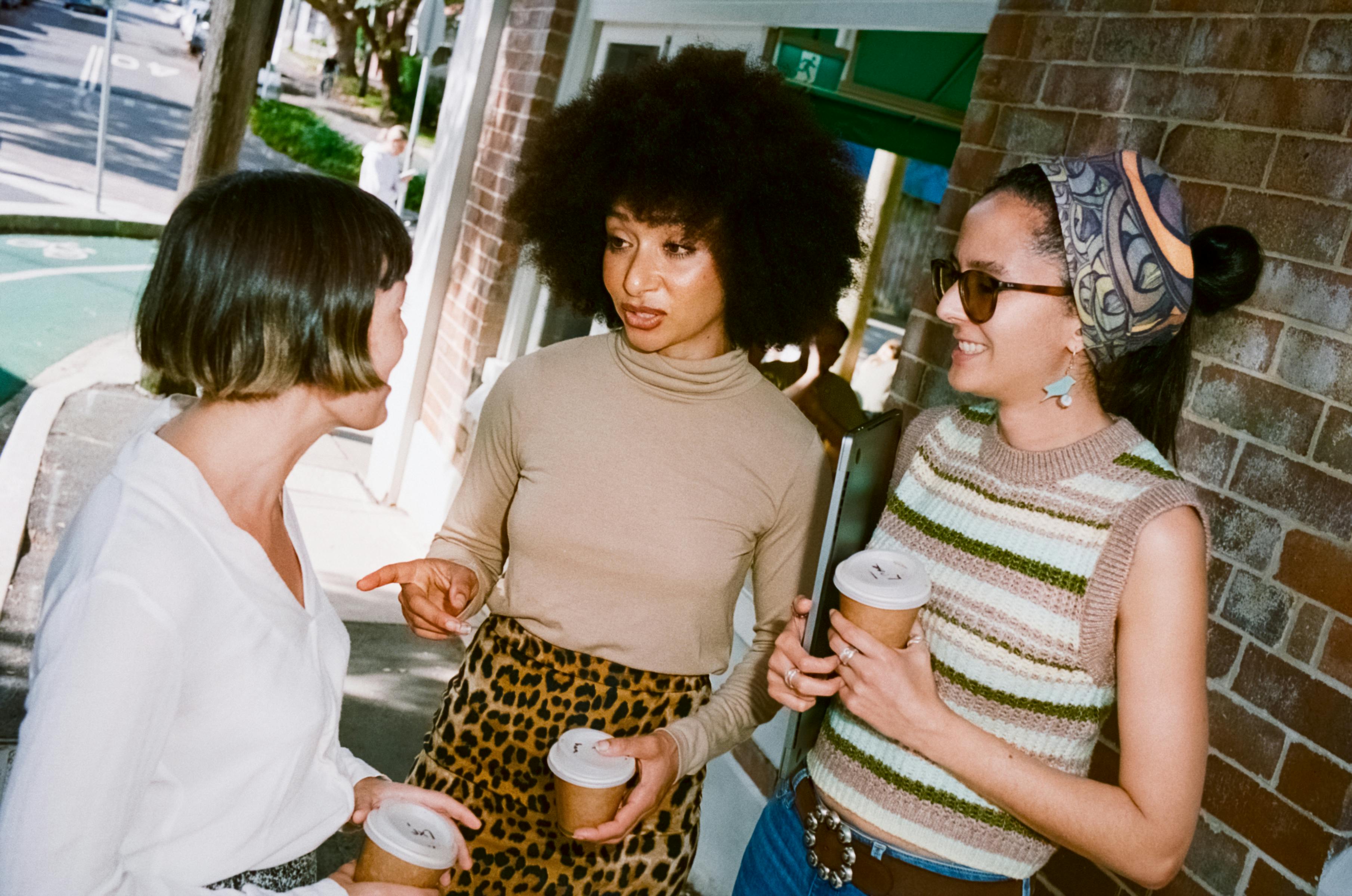 employees outside with coffee