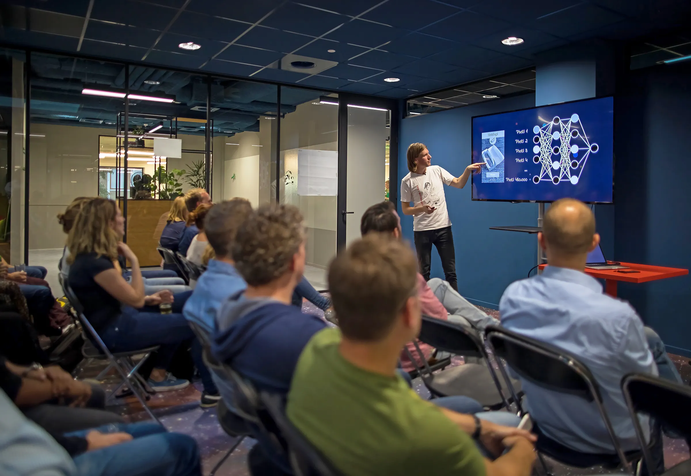Man giving a presentation to a group of people
