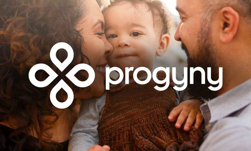 Family with a baby smiling