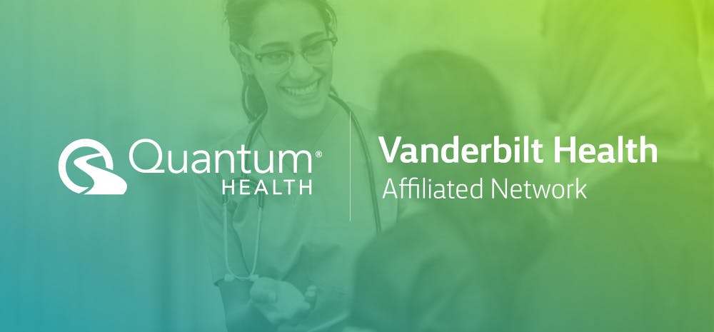 Lady smiling with Vanderbilt logo and Quantum Health icon