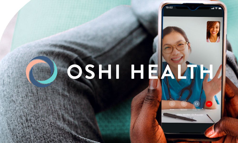 Oshi Health logo with a lady on her phone