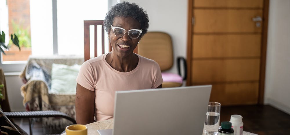 mature woman in front of a computer