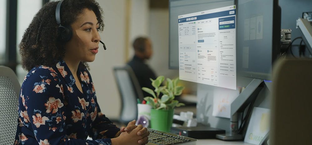 Woman looking at a screen powered by AI