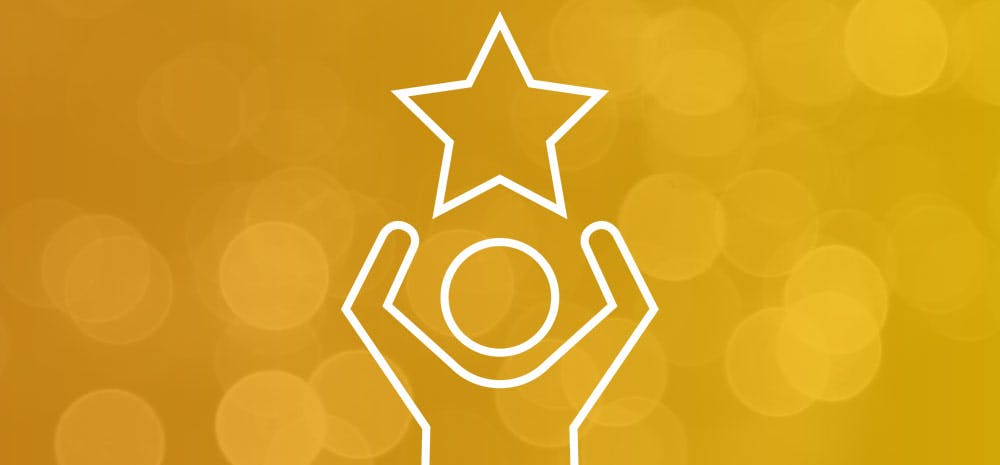 Person holding a star icon