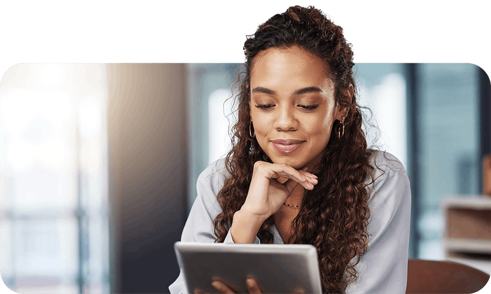 Woman looking at her tablet