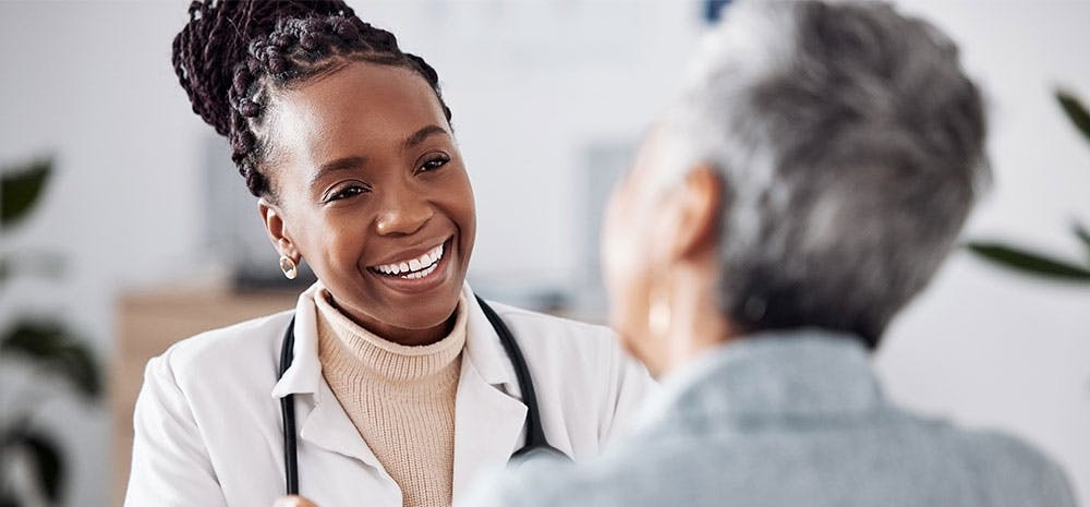 Doctor smiling at their patient