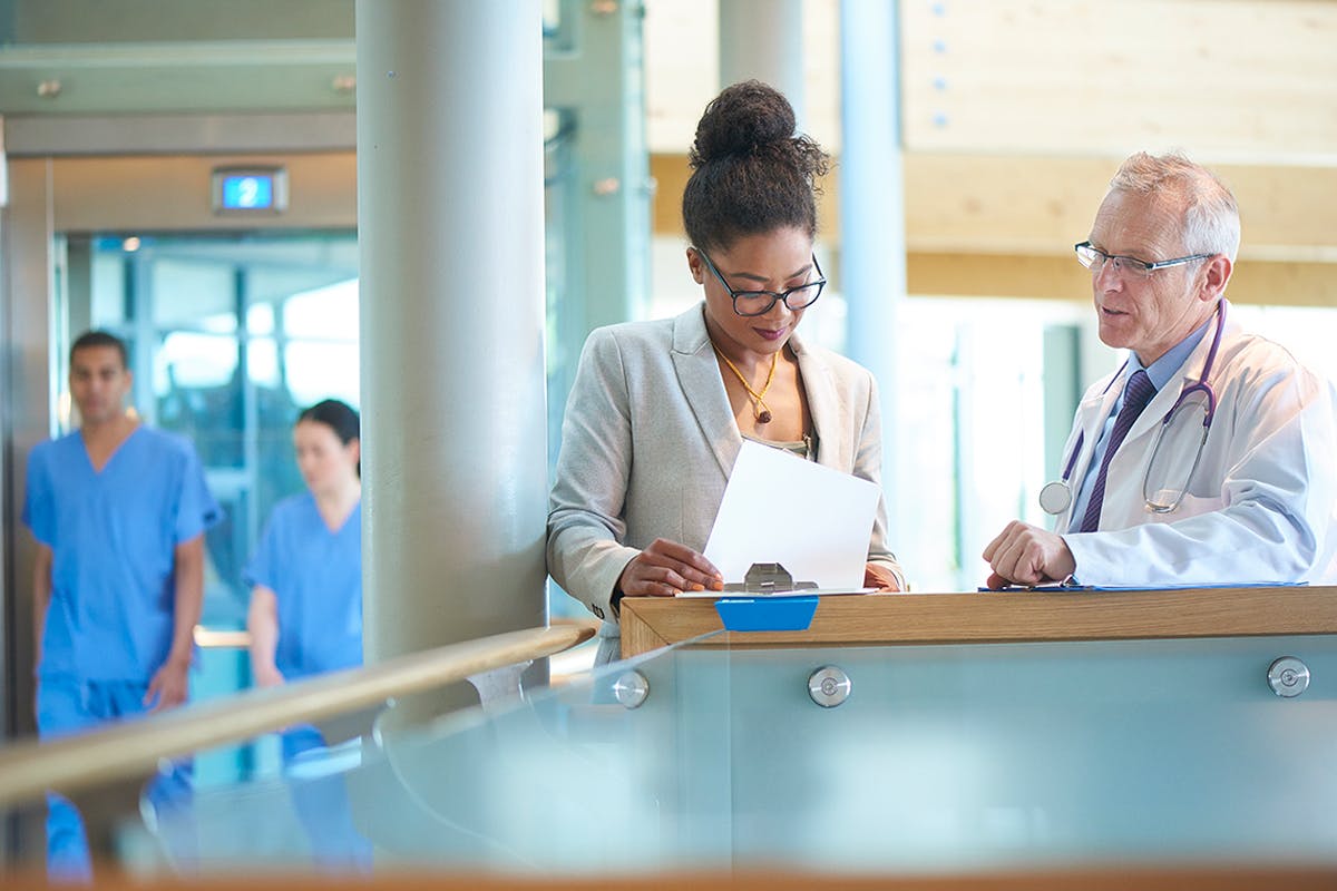 Doctors talking at a hospital