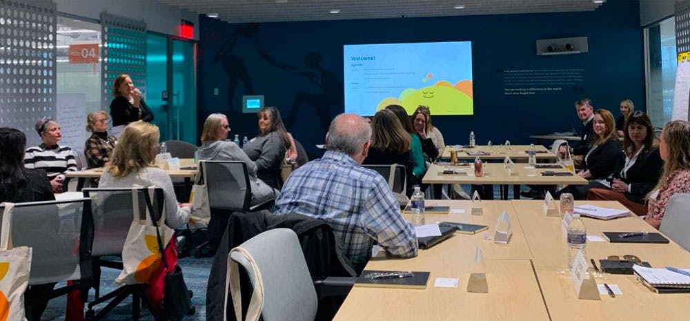 Group of professionals in a conference room discussing