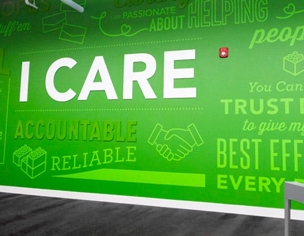A wall that has values wrote out with ICARE center