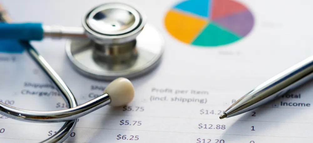Stethoscope and paper with numbers and graph