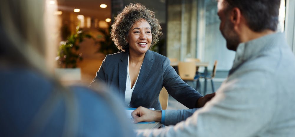 woman smiling in business setting