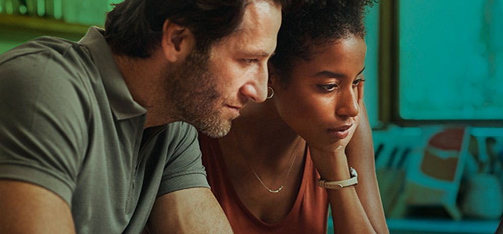 a man and woman viewing information