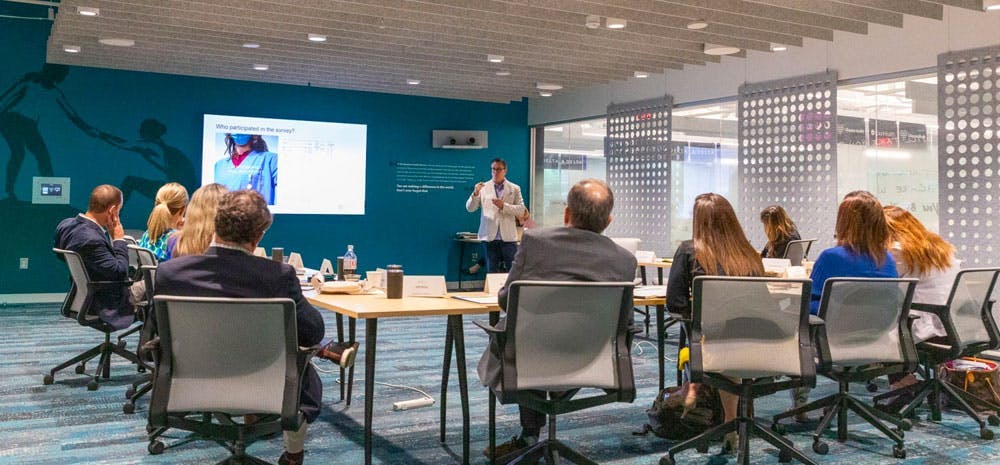 Group of professionals in a conference room discussing