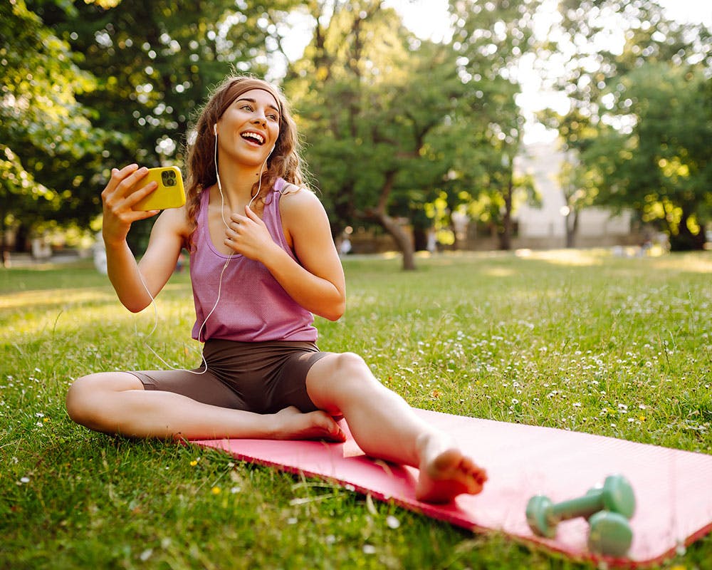 Woman exercising and smiling