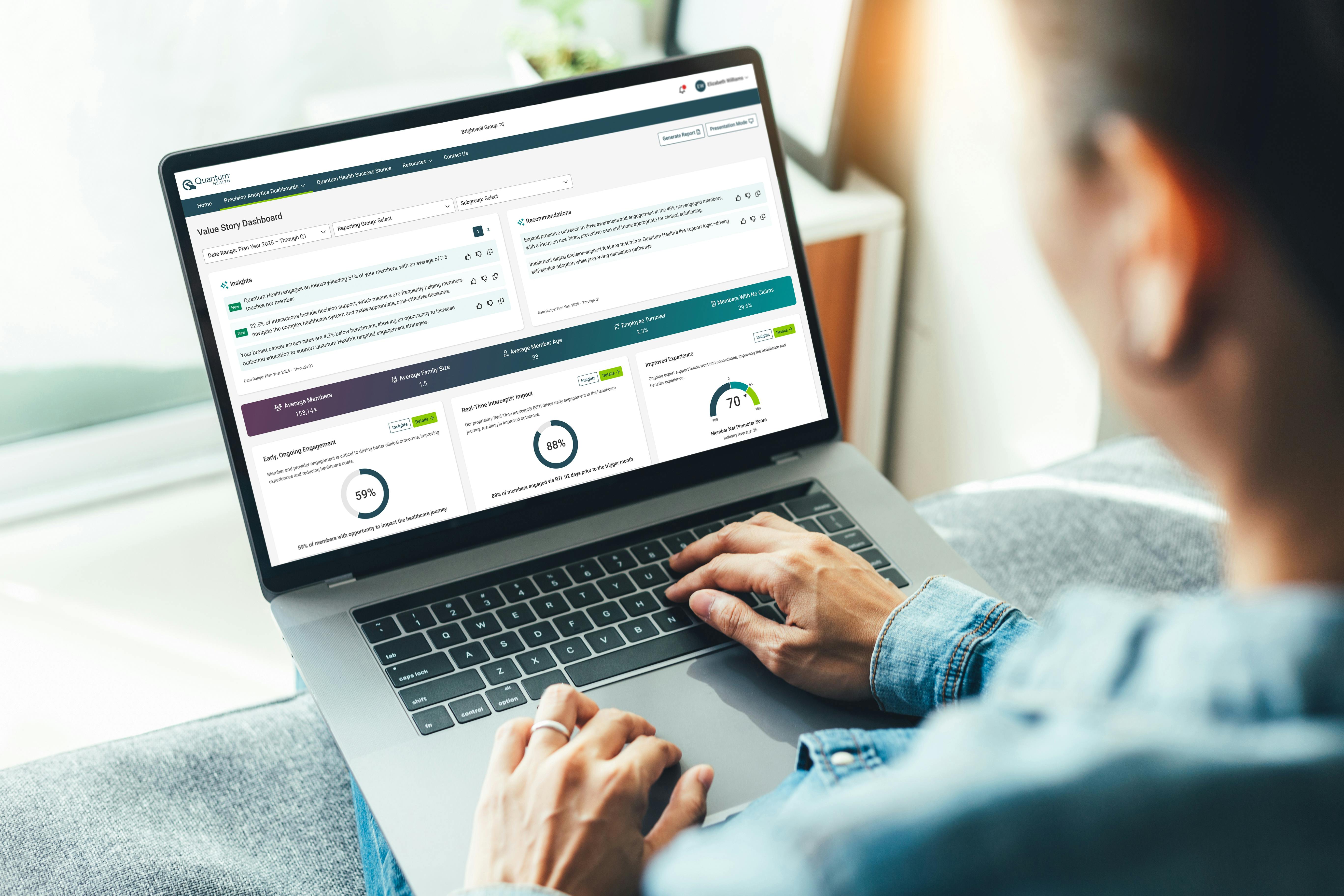 Person on laptop using Quantum Health