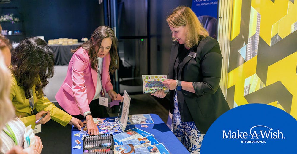 Attendees filling out make-a-wish